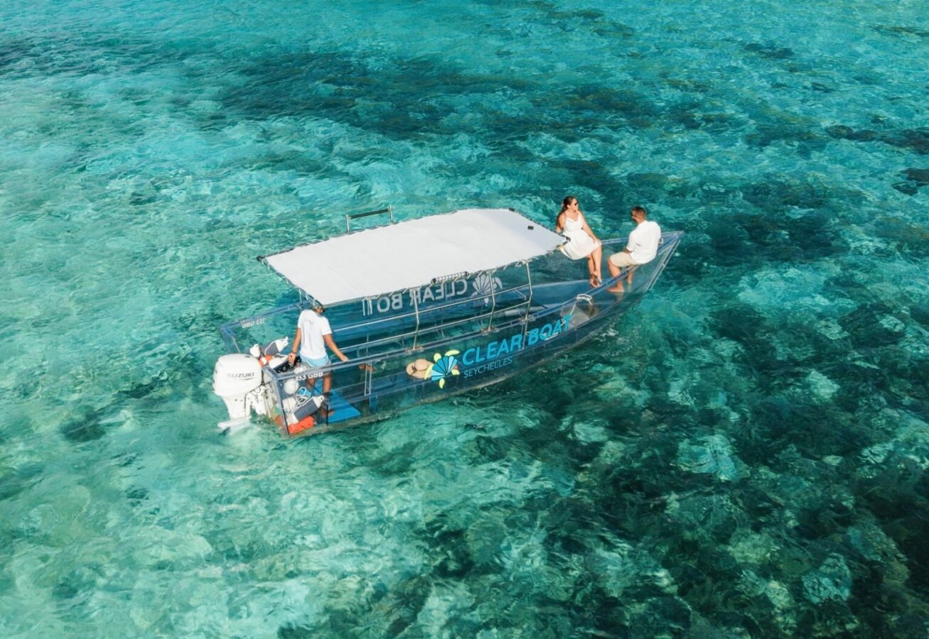 East-coast Zanzibar reef water — glass-bottom boat mornings