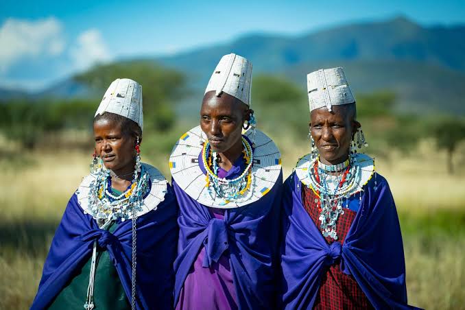 Maasai Mara plains — contracted community visits on conservancy terms