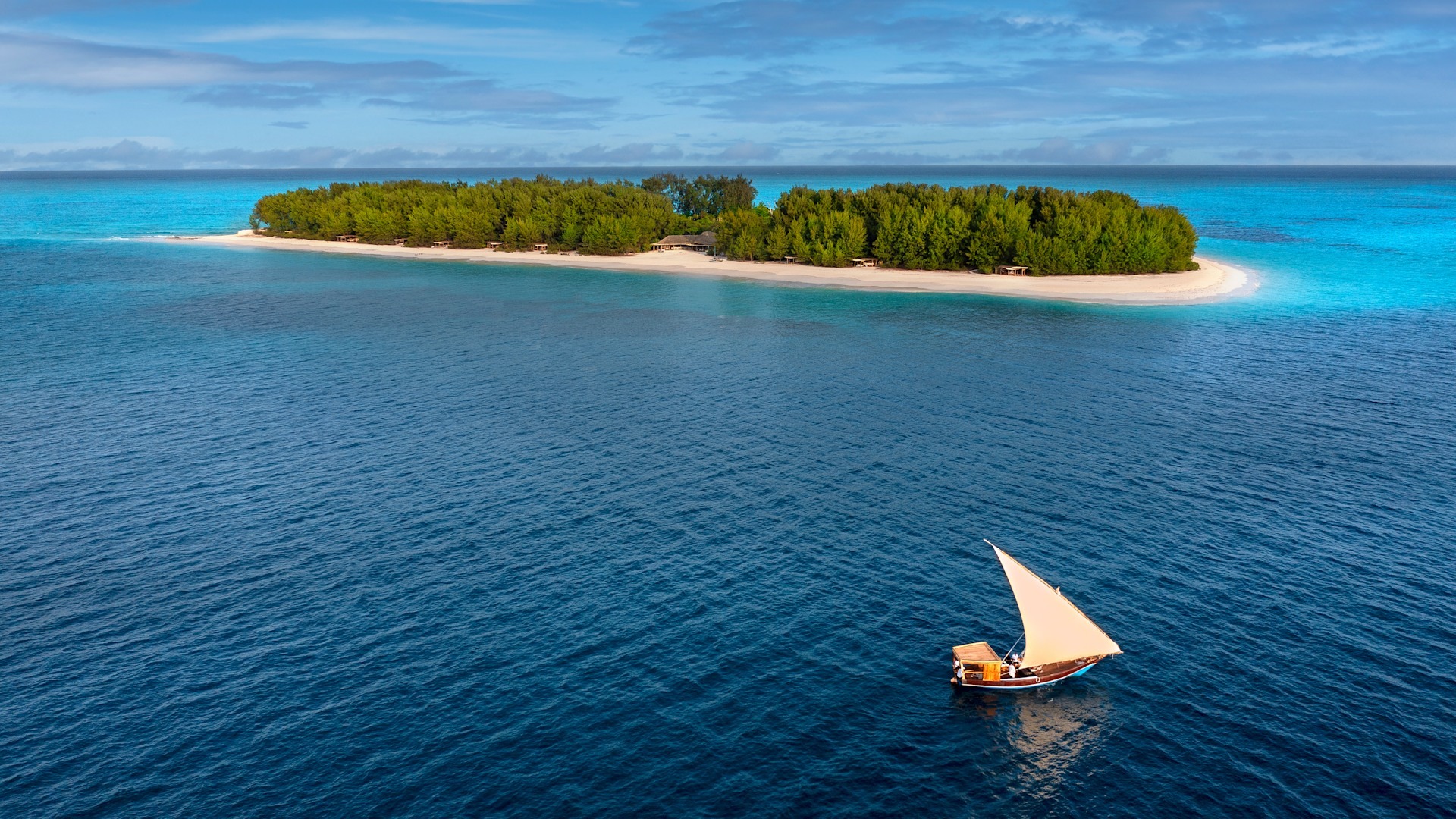 Matemwe beach looking toward Mnemba — marine tour launch