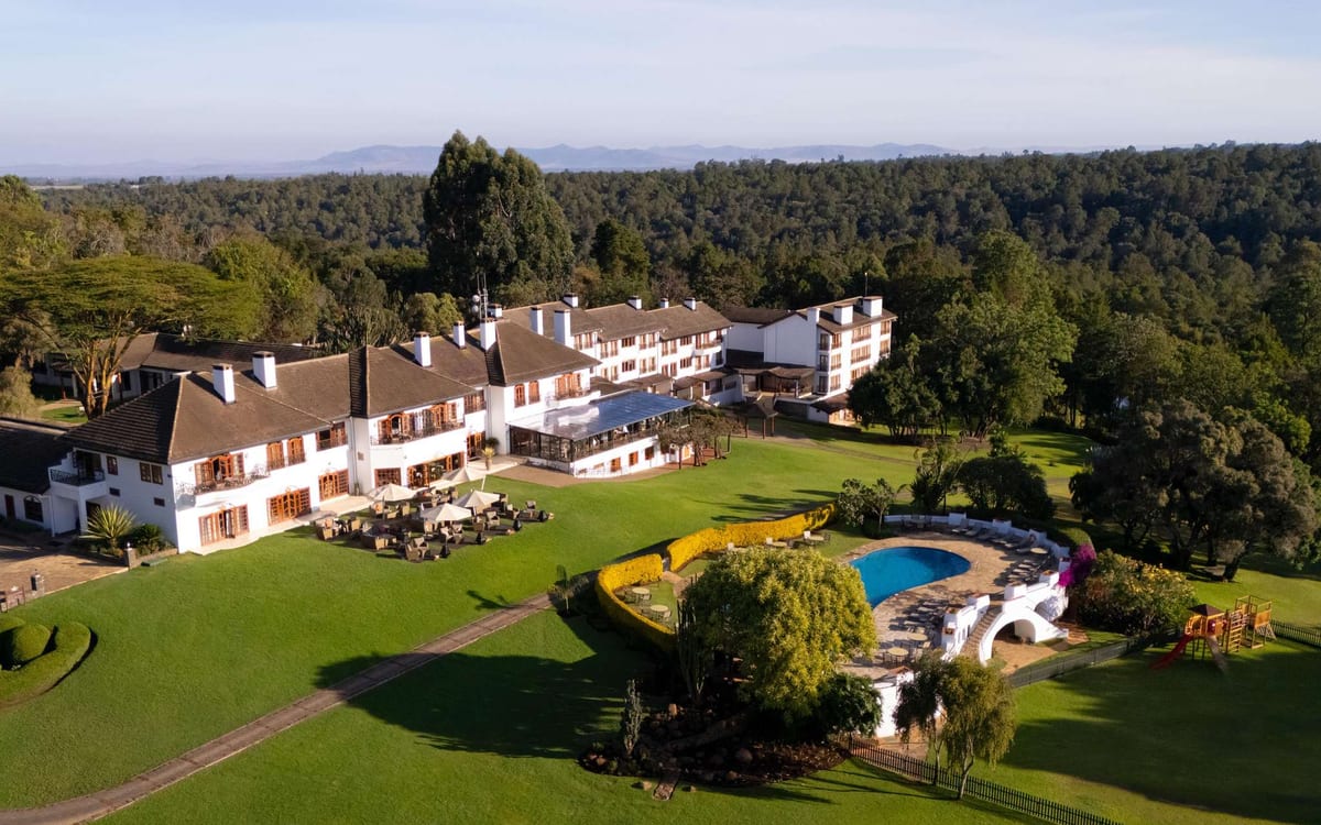 Fairmont Mount Kenya Safari Club lawns before a Maasai Mara chapter